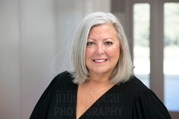 Susan-Coffman-headshot-001-julie-napear-photography-background